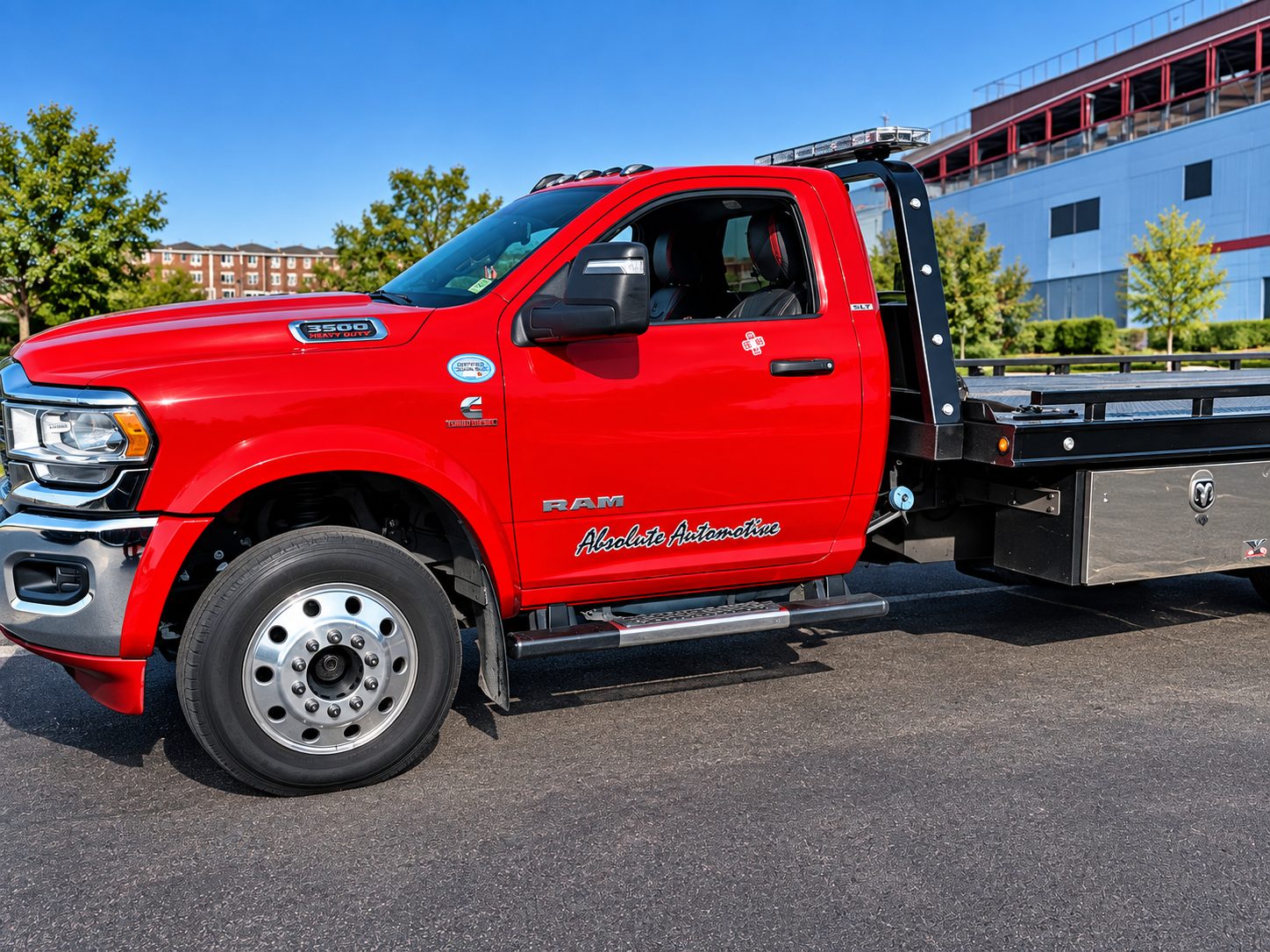 Red Absolute Automotive rollback tow truck