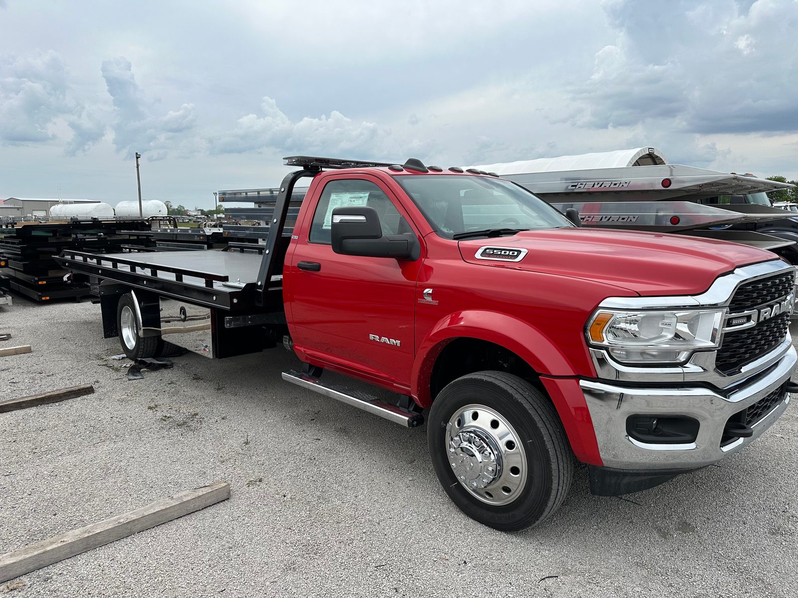 Red rollback tow truck